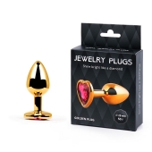 Золотистая анальная пробка с малиновым кристаллом-сердечком - 7 см. - Anal Jewelry Plug - купить с доставкой в Архангельске